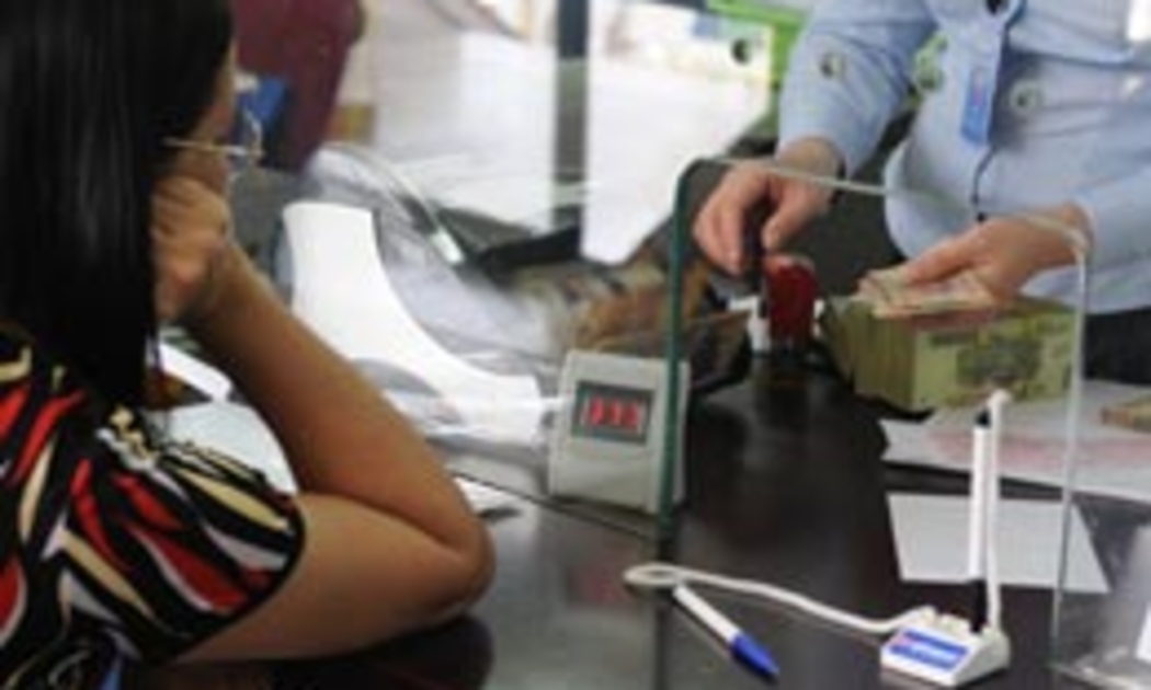 Cái khó của các ngân hàng khi sử dụng nguồn vốn mới là hiệu quả đầu tư, mở rộng hoạt động… không thể thể hiện nhanh, rõ ràng qua mỗi ngày; trong khi nhiều cổ đông vẫn đòi hỏi cổ tức cao, nhất với những trường hợp có thặng dư vốn cổ phần lớn - Ảnh: Quang Liên.