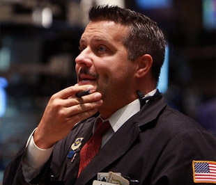 Cả ba chỉ số chứng khoán chính của Mỹ đã đồng loạt đảo chiều đi xuống trong 2 giờ giao dịch cuối cùng trong ngày - Ảnh: Getty.