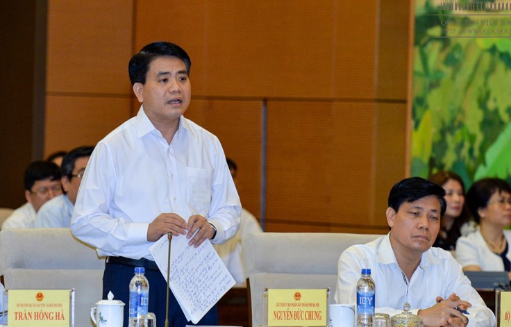 <span style="font-family: 'Times New Roman'; font-size: 15px;">Chủ tịch Hà Nội Nguyễn Đức Chung trả lời chất vấn đại biểu Quốc hội.</span>