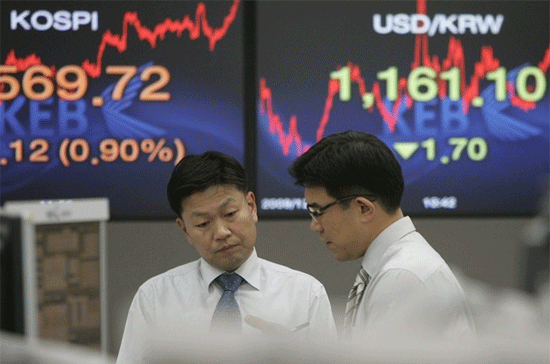 Cứ 11 cổ phiếu giảm giá trong chỉ số MSCI châu Á-Thái Bình Dương hôm nay thì có 9 cổ phiếu tăng giá - Ảnh: Reuters/Daylife.