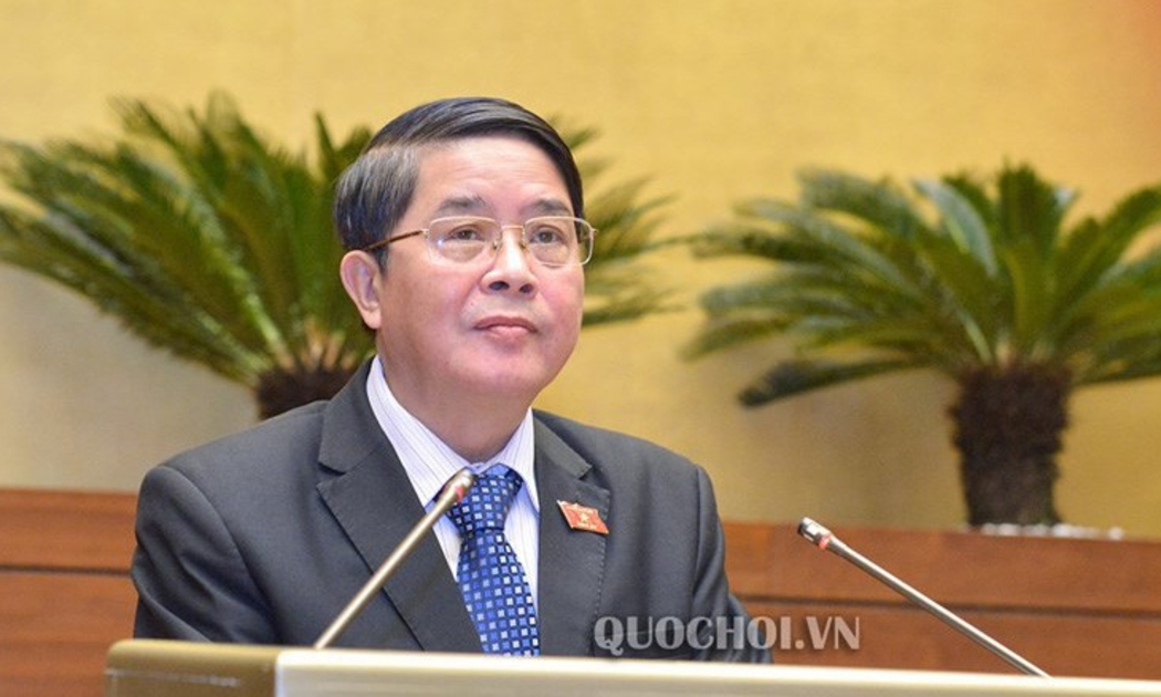 Chủ nhiệm Uỷ ban Tài chính - Ngân sách Nguyễn Đức Hải trình bày báo cáo thẩm tra.