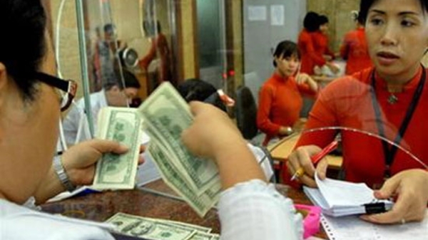 “Bước nhảy” tỷ giá đầu năm: Lợi thì có lợi…