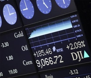 Chỉ số Dow Jones đã chính thức vượt mốc 9.000 điểm, lên mức cao nhất kể từ tháng 1/2009 - Ảnh: AP.