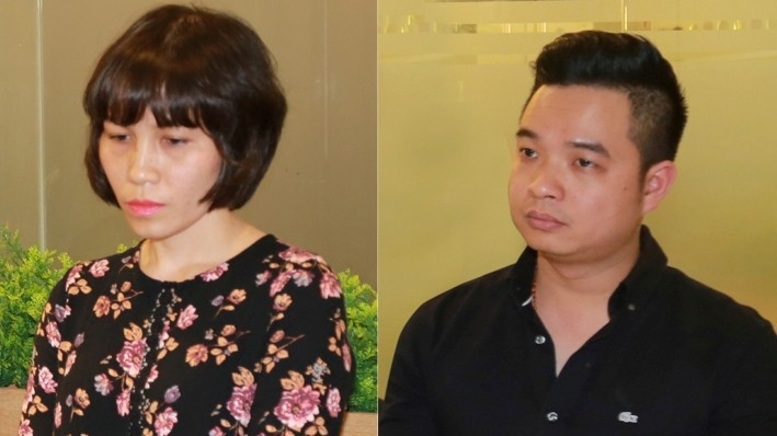 Bị can Châu Nguyên Anh (mặc áo hoa) và bị can Phạm Quang Minh.