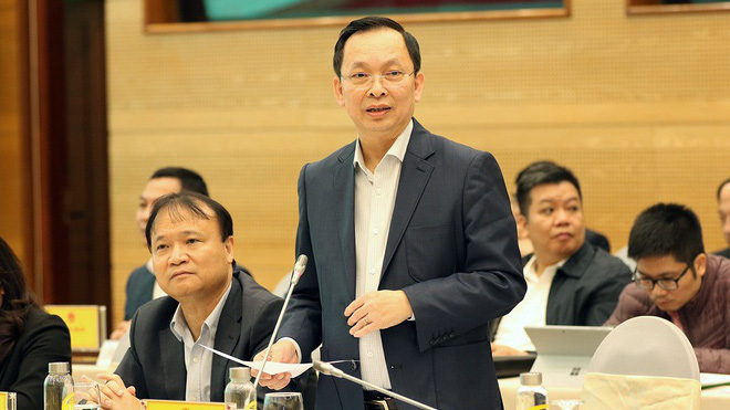 Phó Thống đốc Đào Minh Tú trả lời báo giới.