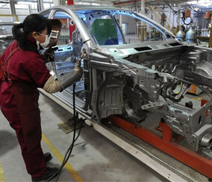 Theo những số liệu được điều chỉnh lại vừa công bố, GDP của Trung Quốc trong năm 2007 tăng trưởng 13%, cao hơn con số được công bố trước đó là 11,9%, đạt mức 25.731 tỷ Nhân dân tệ (tương đương 3.380 tỷ USD) - Ảnh: Reuters.