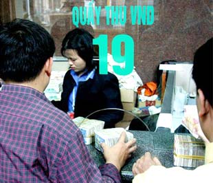 Trước bối cảnh kinh tế khó khăn, hoạt động ngân hàng không thuận lợi, một số đề án đã chủ động tạm ngừng tiến độ và chờ đợi - Ảnh: Việt Tuấn.