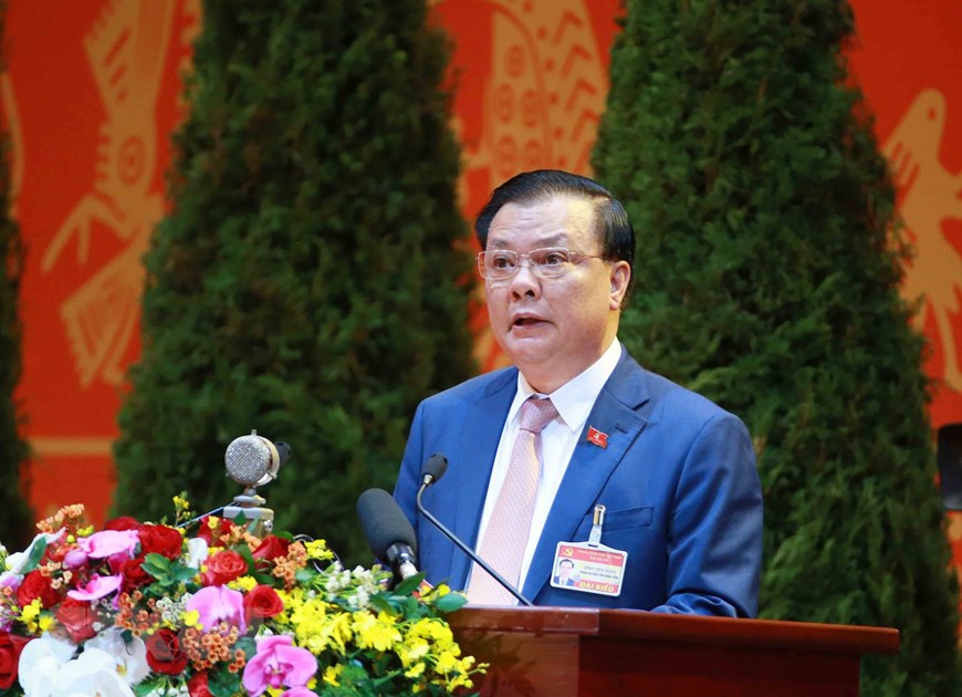 Đồng chí Đinh Tiến Dũng, Ủy viên Trung ương Đảng, Bộ trưởng Bộ Tài chính tham luận về vấn đề 