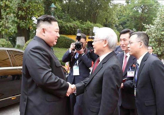 Tổng bí thư, Chủ tịch nước Nguyễn Phú Trọng đón Chủ tịch Kim Jong-un - Ảnh 1.
