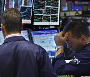 Chứng khoán Mỹ phiên giao dịch cuối tuần đã giảm điểm - Ảnh: Reuters.