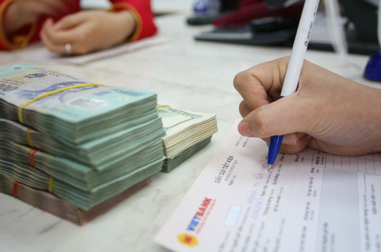 Dự kiến từ ngày 15/10 các ngân hàng sẽ rút lãi suất huy động VND về cao nhất 11%/năm.