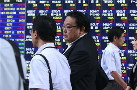 Đà tăng đang được duy trì khá tốt trên thị trường chứng khoán châu Á - Ảnh: AP.