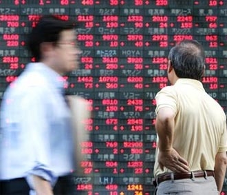 Thị trường Trung Quốc cũng mất sức đề kháng với đà sụt giảm của châu Á trong phiên giao dịch ngày hôm nay - Ảnh: AP.