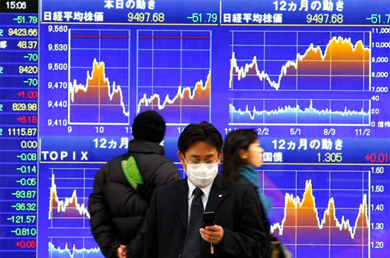 Quý vừa qua là quý suy giảm đầu tiên của kinh tế Nhật trong vòng 5 quý - Ảnh: AP.