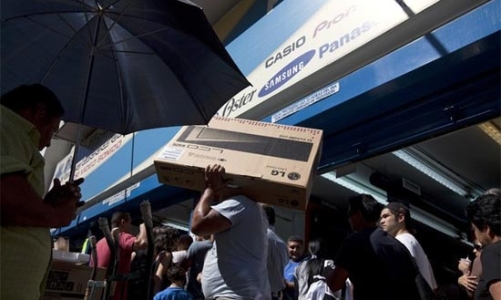 Phá giá đồng tiền, Venezuela đối mặt nhiều rắc rối mới