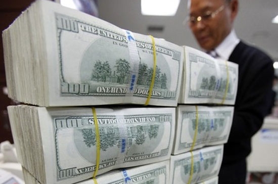 Rủi ro tỷ giá, rủi ro lãi suất ngoại tệ là một thực tế bất khả kháng - Ảnh: Reuters.