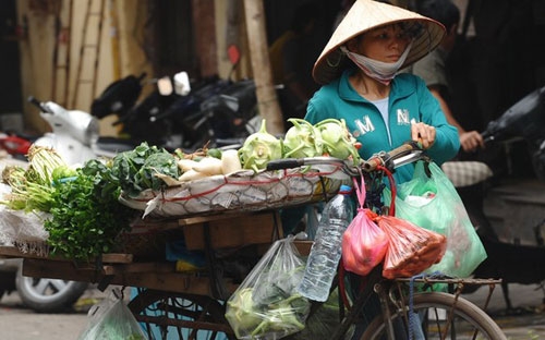 CPI tính theo năm
của tháng 11, tuy cao hơn so với 3 tháng trước, nhưng vẫn thấp xa so với
 đỉnh điểm tháng 8/2011 (23,02%) - Ảnh: Getty.<br>