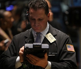 Chứng khoán Mỹ đã có phiên đảo chiều lên điểm vào cuối ngày giao dịch - Ảnh: Getty Images.