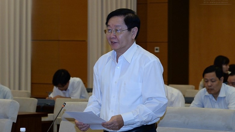 Bộ trưởng Bộ Nội vụ Lê Vĩnh Tân trình bày tờ trình của Chính phủ.