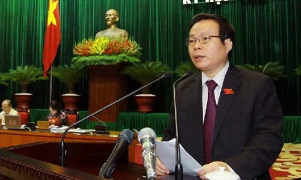 Chủ nhiệm Ủy ban Tài chính - Ngân sách của Quốc hội Phùng Quốc Hiển trình bày báo cáo giải trình tiếp thu về thực hiện ngân sách 2012 và dự toán ngân sách 2013, chiều 10/11.<br>