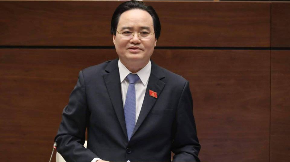 Bộ trưởng Bộ giáo dục và đào tạo Phùng Xuân Nhạ trả lời chất vấn - Ảnh: Quang Phúc 
