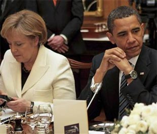 Thủ tướng Đức Angela Merkel (trái) và Tổng thống Mỹ Barack Obama trong bữa tối dành cho các nguyên thủ quốc gia tham dự hội nghị thượng đỉnh G20, tổ chức tại số 10 phố Downing, London ngày 1/4. Thị trường đang ngóng đợi thông tin của cuộc họp thượng đỉnh G20 diễn ra ngày 2/4 này - Ảnh: Reuters.