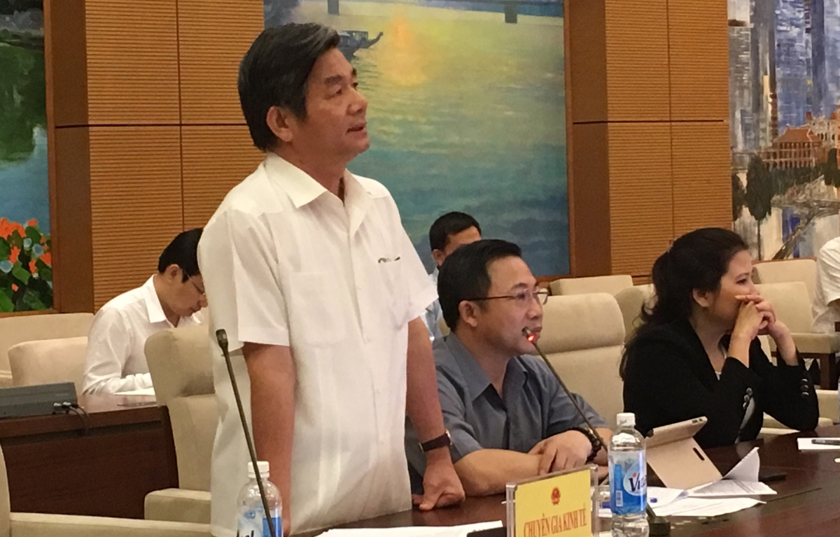 Nguyên Bộ trưởng Bộ Kế hoạch và Đầu tư Bùi Quang Vinh phát biểu tại phiên giải trình.