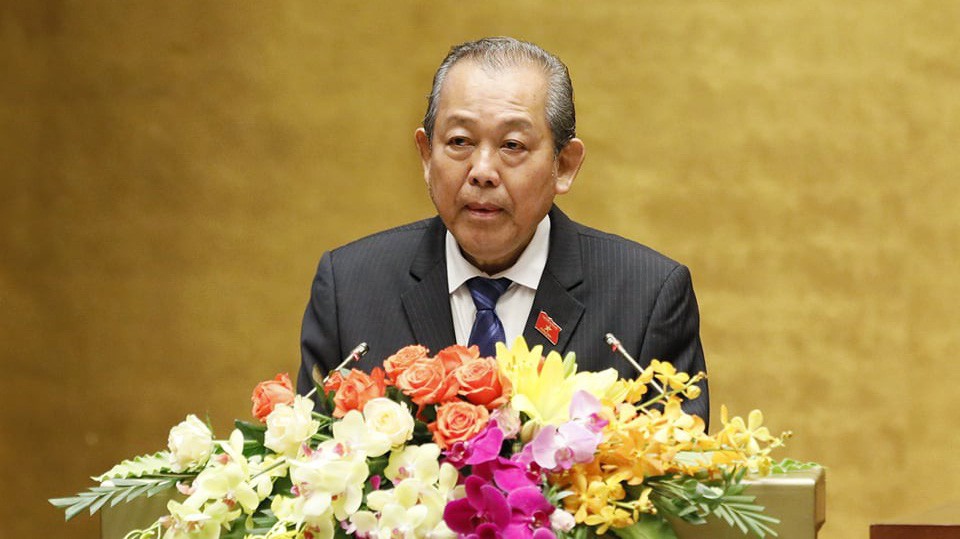 Phó thủ tướng Trương Hoà Bình trình bày báo cáo của Chính phủ - Ảnh: Quang Phúc.