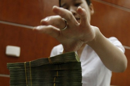 Doanh số tăng đột biến, nhưng thị trường liên ngân hàng vẫn đang cho thấy sự ổn định ở chỉ báo lãi suất - Ảnh: Reuters.