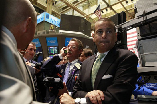 Thị trường chứng khoán Mỹ khép phiên giao dịch ngày 16/4 với kết quả tăng giảm trái chiều ở ba chỉ số chính - Ảnh: Reuters.