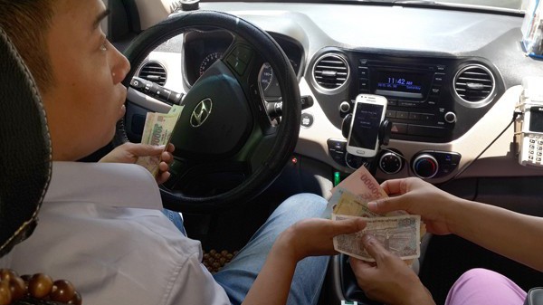 Hà Nội kiểm tra nghĩa vụ thuế 200 đối tác của Grab - Ảnh minh hoạ.