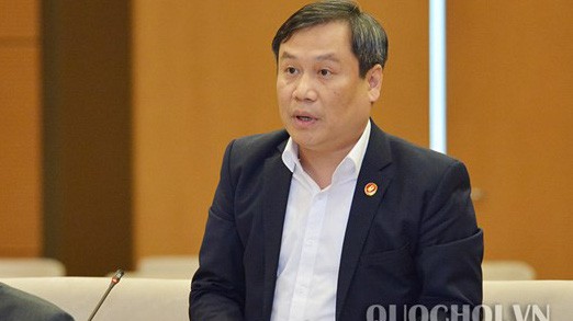 Thứ trưởng Bộ Kế hoạch và Đầu tư Vũ Đại Thắng trình bày tờ trình dự án luật 