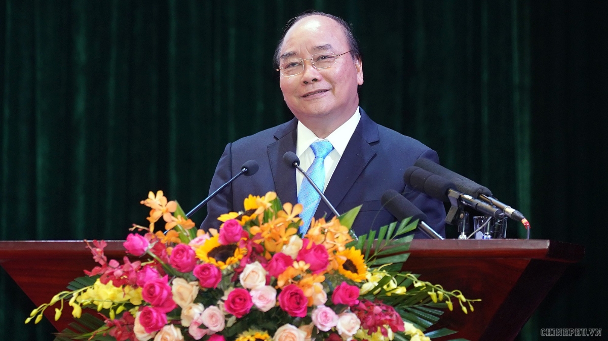 Với các nhà đầu tư, Thủ tướng nhắn nhủ đã cam kết đầu tư vào Lào Cai thì phải quyết tâm triển khai thực hiện cho bằng được. Ảnh: VPG