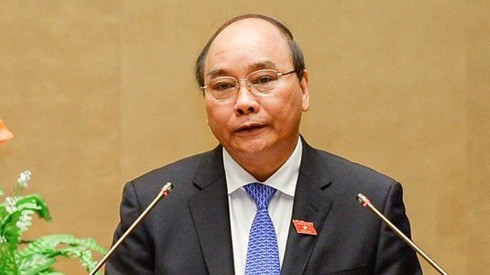 Thủ tướng Nguyễn Xuân Phúc báo cáo giải trình trước khi trả lời chất vấn trực tiếp.