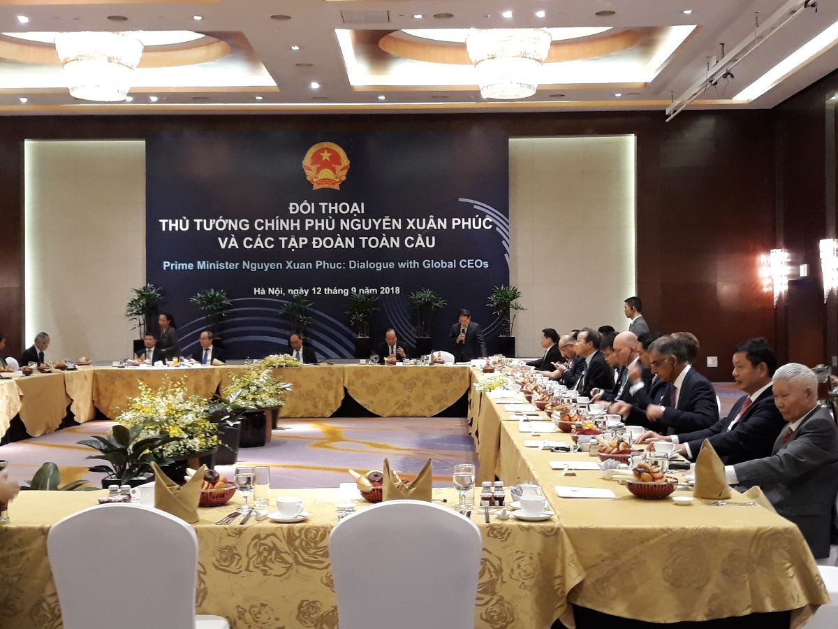 Thủ tướng đối thoại với lãnh đạo các tập đoàn toàn cầu - Ảnh 1.