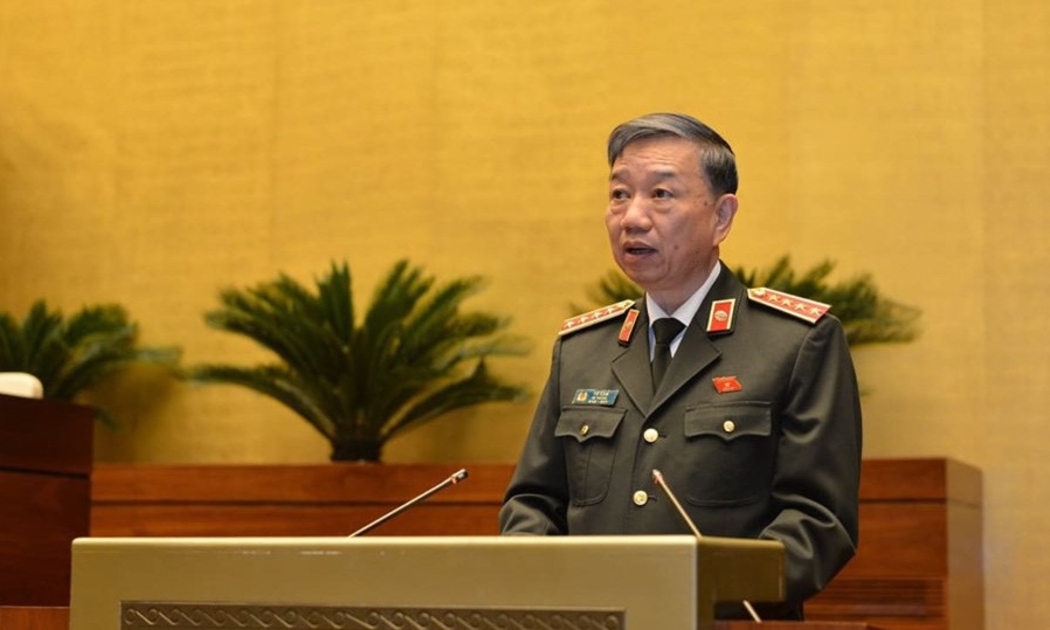 Bộ trưởng Bộ Công an Tô Lâm trình bày báo cáo - Ảnh: Quang Phúc