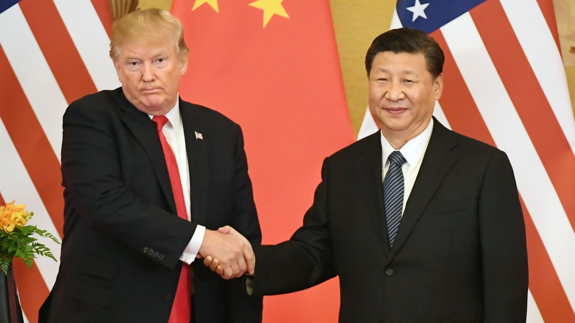 Ông Trump châm ngòi cho chiến tranh thương mại Mỹ - Trung  vào năm 2018 - Ảnh: Reuters.