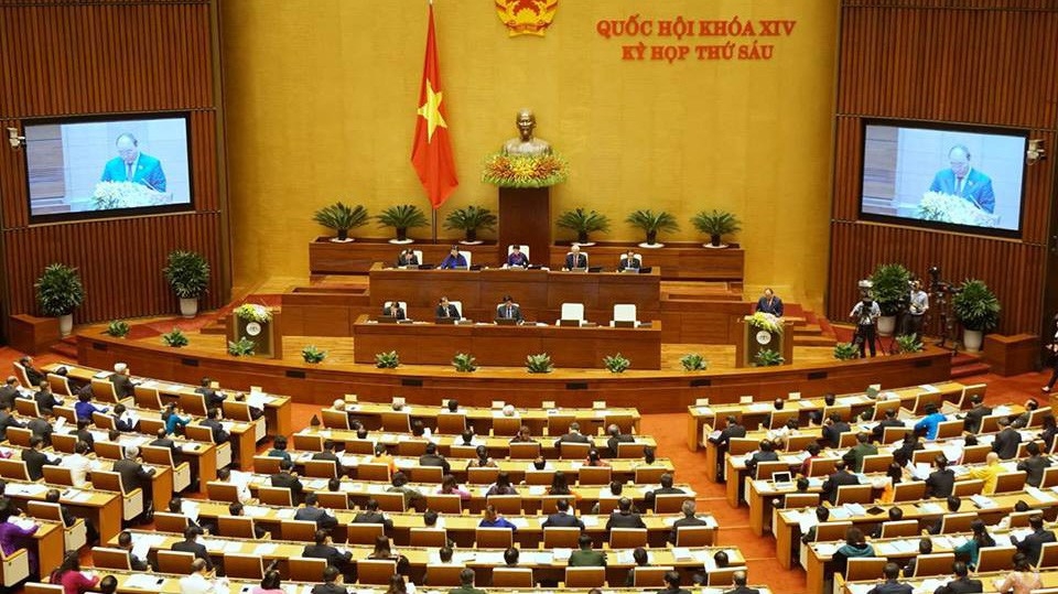 Thủ tướng Nguyễn Xuân Phúc trình bày báo cáo trong phiên khai mạc kỳ họp thứ sáu của Quốc hội. Ảnh: Quang Phúc.