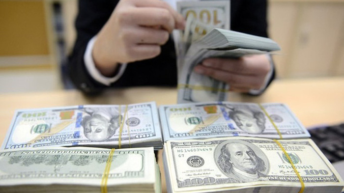 Lượng kiều hối năm 2020 được dự báo giảm còn 15,7 tỷ USD. Ảnh: QP.