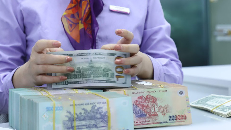 Tỷ giá USD/VND có một năm ổn định - Ảnh: Quang Phúc