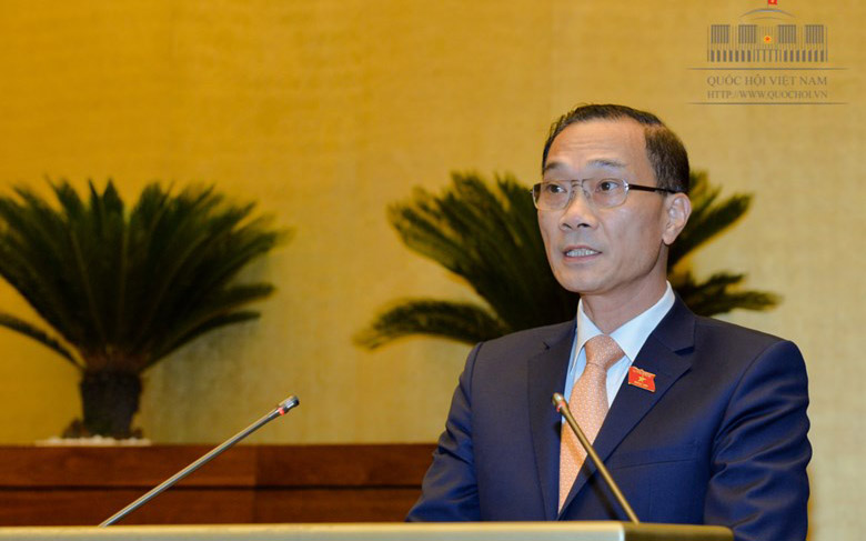 Chủ nhiệm Uỷ ban Kinh tế Vũ Hồng Thanh trình bày báo cáo tiếp thu, giải trình.