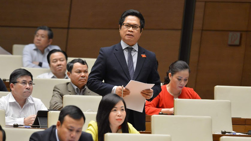 Chủ tịch Phòng Thương mại và công nghiệp Việt Nam Vũ Tiến Lộc phát biểu tại hội trường. 