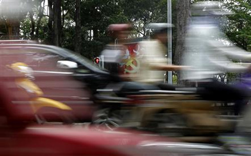 Tình hình kinh tế vĩ mô quý 1/2015 tiếp tục xu thế ổn định và tốt hơn - Ảnh: Reuters.<br>
