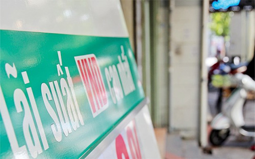 Một số đại biểu Quốc hội cho rằng trong cơ chế thị trường, lãi suất nên để hai bên tự thỏa thuận.