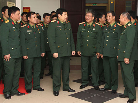 Đại tướng Phùng Quang Thanh, Bộ trưởng Bộ Quốc phòng, tại hội nghị quân chính Tổng cục 2, tháng 1/2014 - Ảnh: QĐND.<br>
