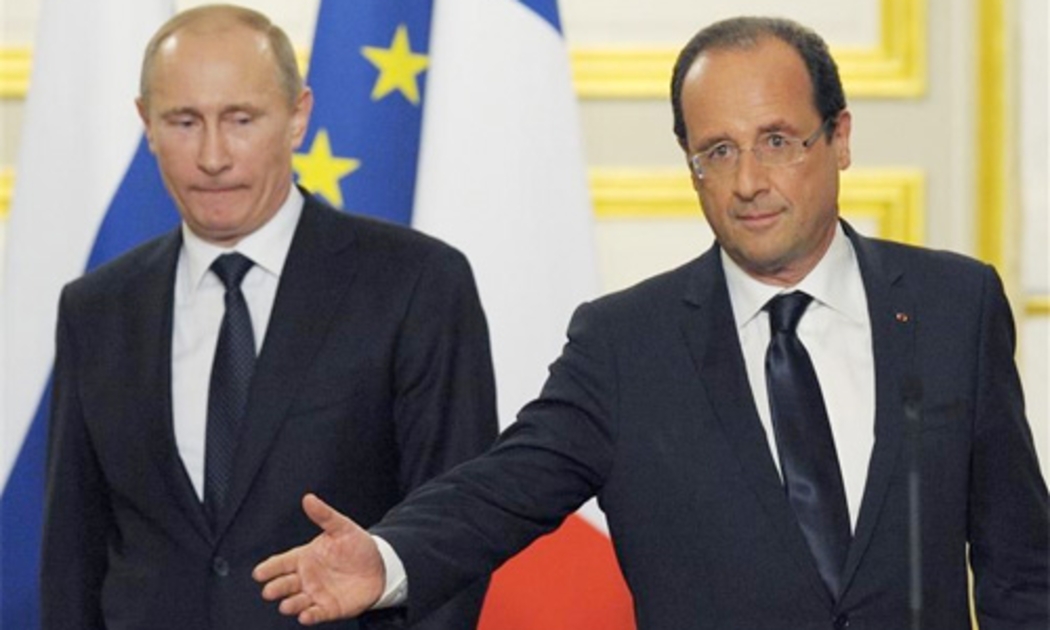 Tổng thống Nga Putin và Tổng thống Pháp Hollande trong một lần gặp gỡ.<br>