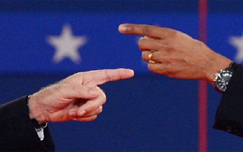 Hai đối thủ tranh luận gay gắt về chính sách năng lượng và tác động của giá xăng dầu tới đời sống kinh tế - Nguồn: CNN.<br>