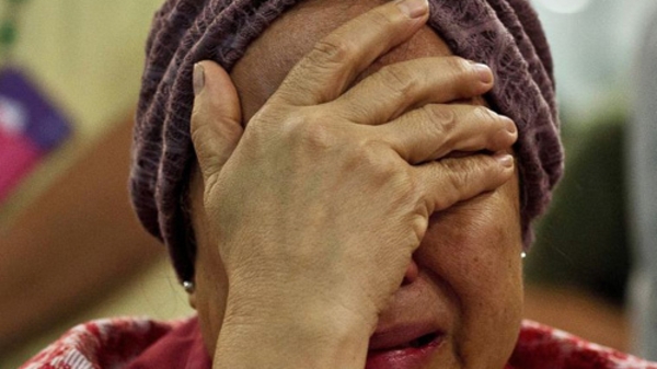 Thân nhân hành khách MH17 đón tin dữ