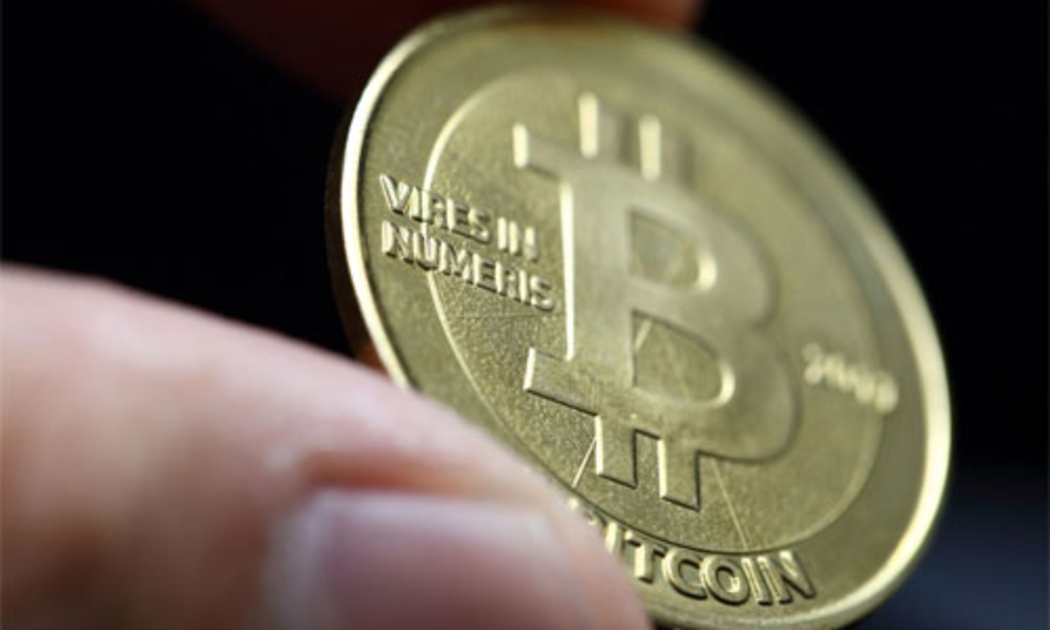 Được giới thiệu lần đầu vào năm 2008, Bitcoin là sản phẩm của một nhà lập trình hoặc một nhóm nhà lập trình giấu mặt có tên Satoshi Nakamoto - Ảnh: AP.