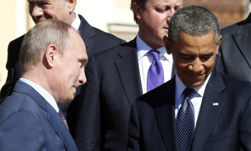 Tổng thống Nga Vladimir Putin (trái) và Tổng thống Mỹ Barack Obama (phải) tại hội nghị thượng đỉnh G-20 diễn ra ở St. Petersburg, Nga tháng 6/2013 - Ảnh: Reuters.<br>